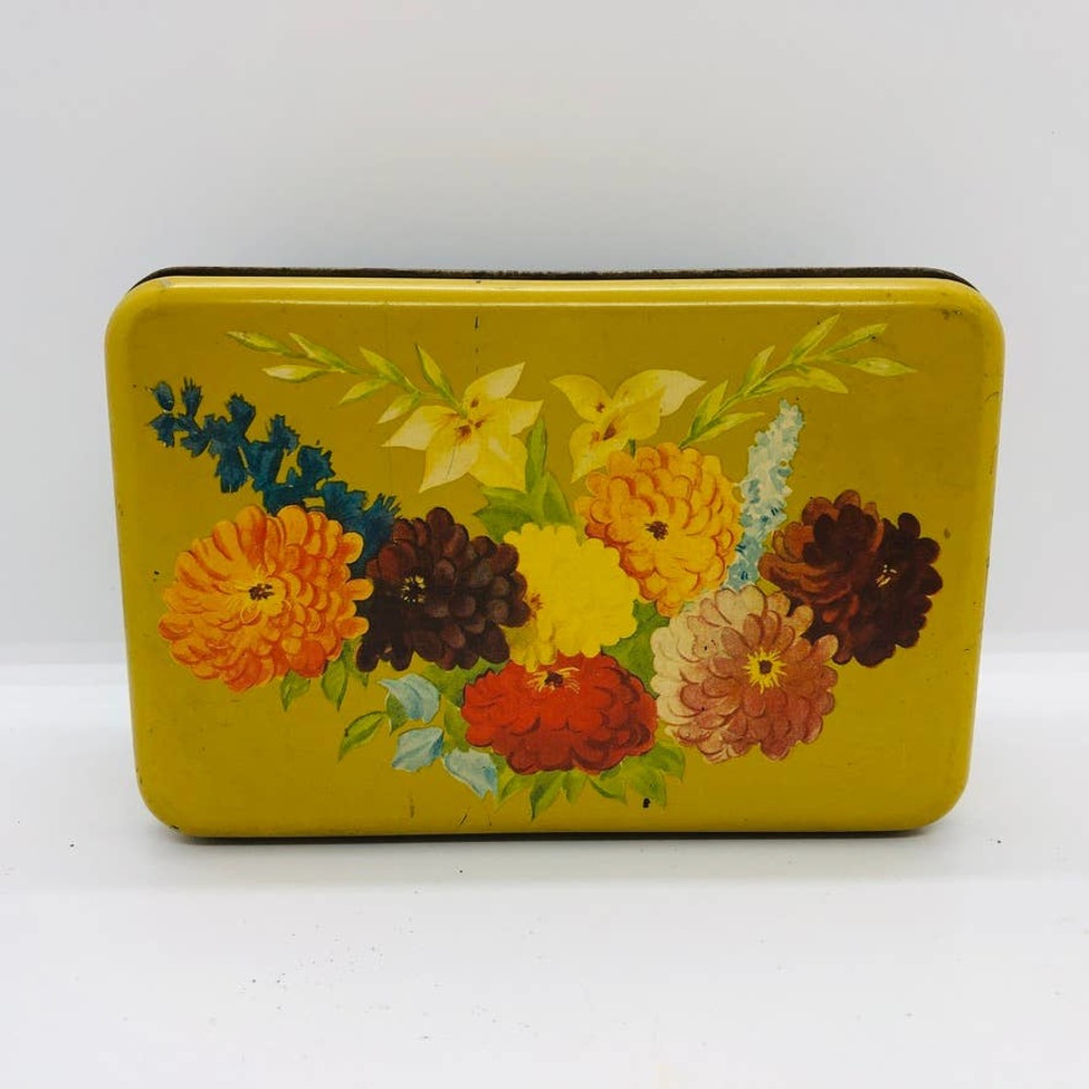 Helen Harrisons Candies Chicago 1940's mustard yellow with floral bouquet on top